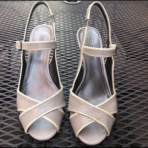 Joan and David Circa Pumps